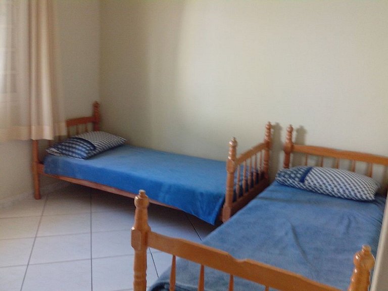 Casa aconchegante e com piscina, pertinho da praia