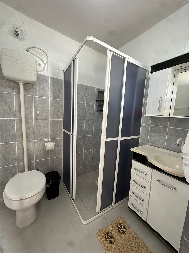 Apart a poucos metros da praia